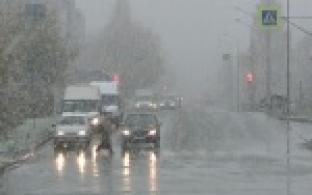 Внезапный снегопад накрыл город