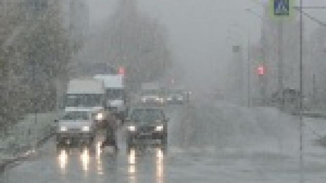 Внезапный снегопад накрыл город